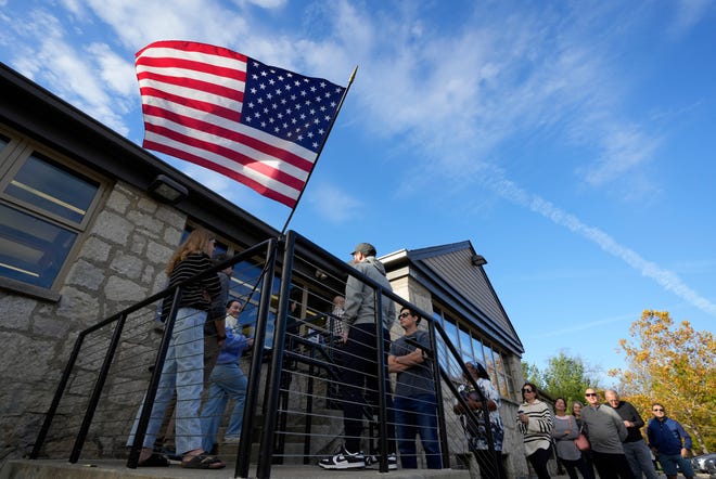 An American flag flies outside of the Wolfe Park shelter house in Bexley on the morning of Election Day, November 5, 2024.