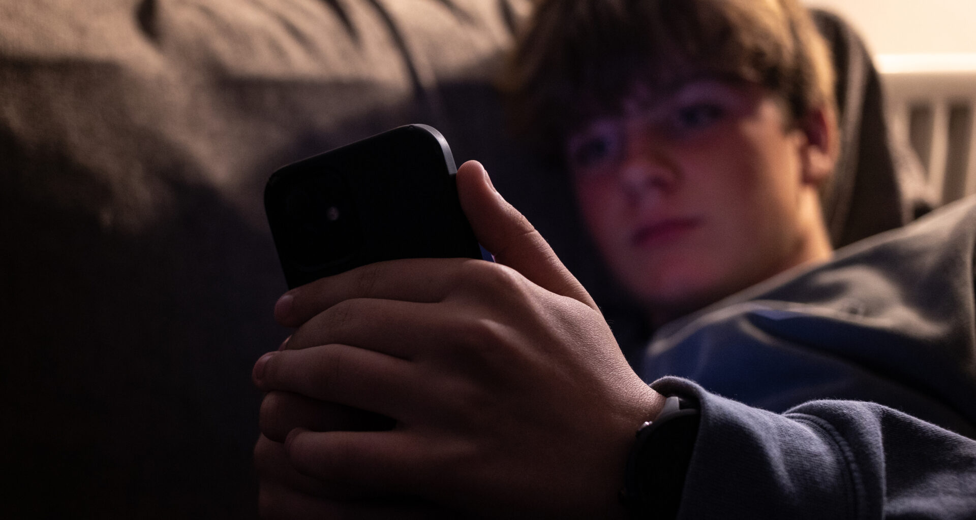 boy using smartphone
