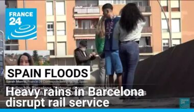 Heavy rains in Barcelona disrupt rail service as troops search for more flood victims in Valencia