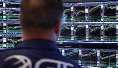 Wall Street indexes dip with focus on Trump policies, economic data