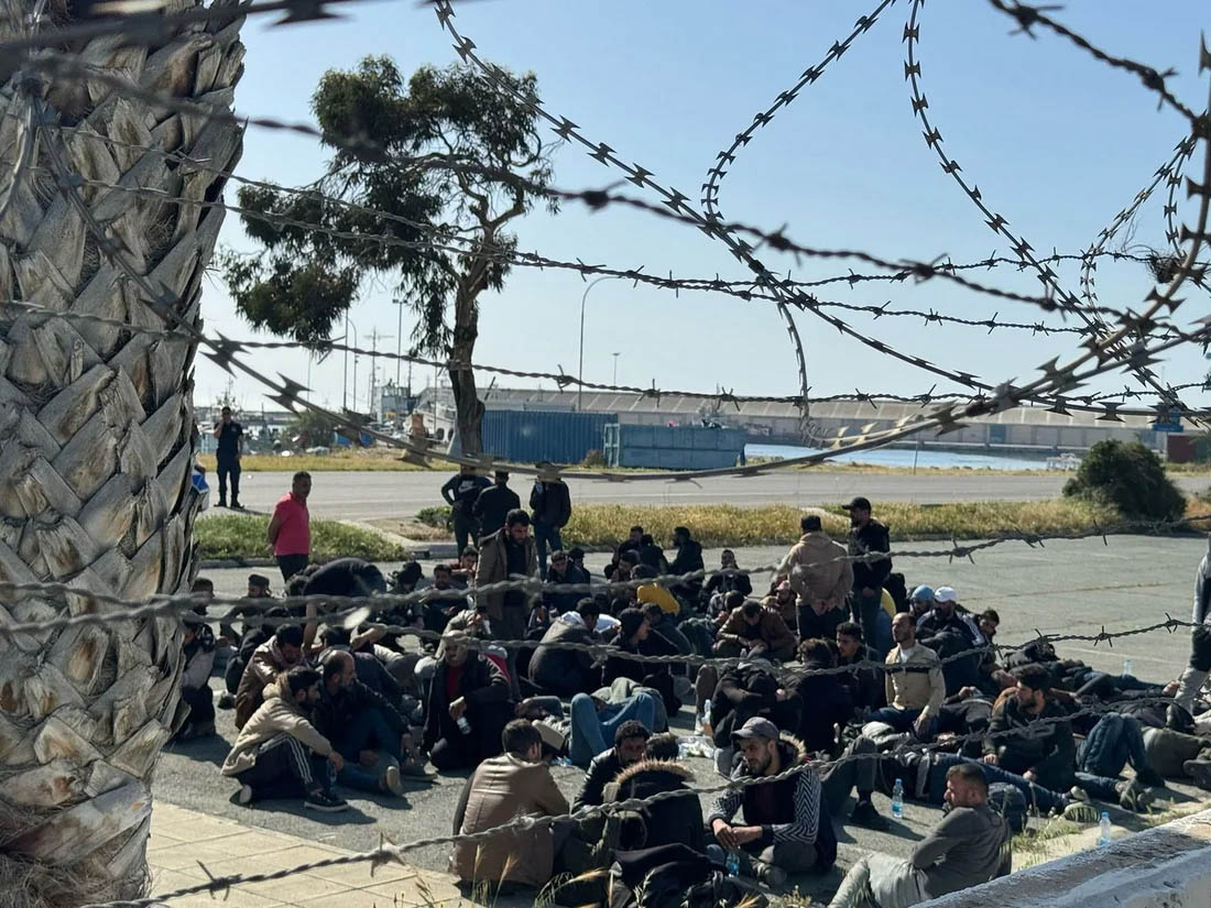 cover Police continue migrant returns