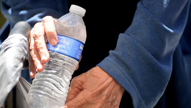 A bottle of water shared with ladies waiting for a ride made their day.