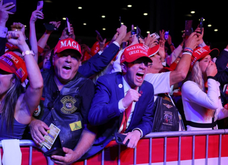 Supporters of Republican presidential nominee and former U.S. President Donald Trump celebrate after the Fox Network called the election in his favor at the site of his rally, at the Palm Beach County Convention Center in West Palm Beach, Florida, U.S., November 6