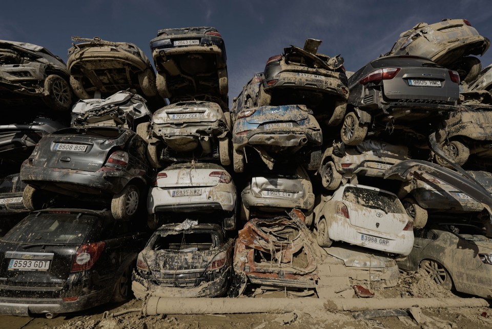 Cars are loaded on top of one another in the horror images