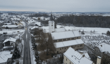 First Snow Blankets Rural Slovenia Town