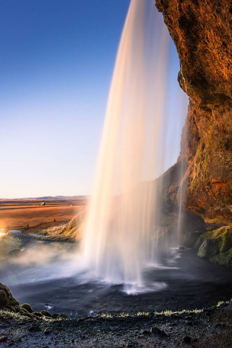 Seljalandsfoss Waterfall at sunset, Iceland.