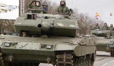 The Spanish participation in a parade in Latvia with soldiers and armoured vehicles