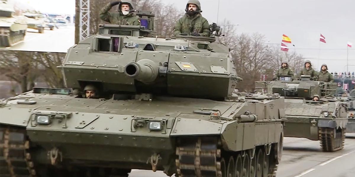 The Spanish participation in a parade in Latvia with soldiers and armoured vehicles