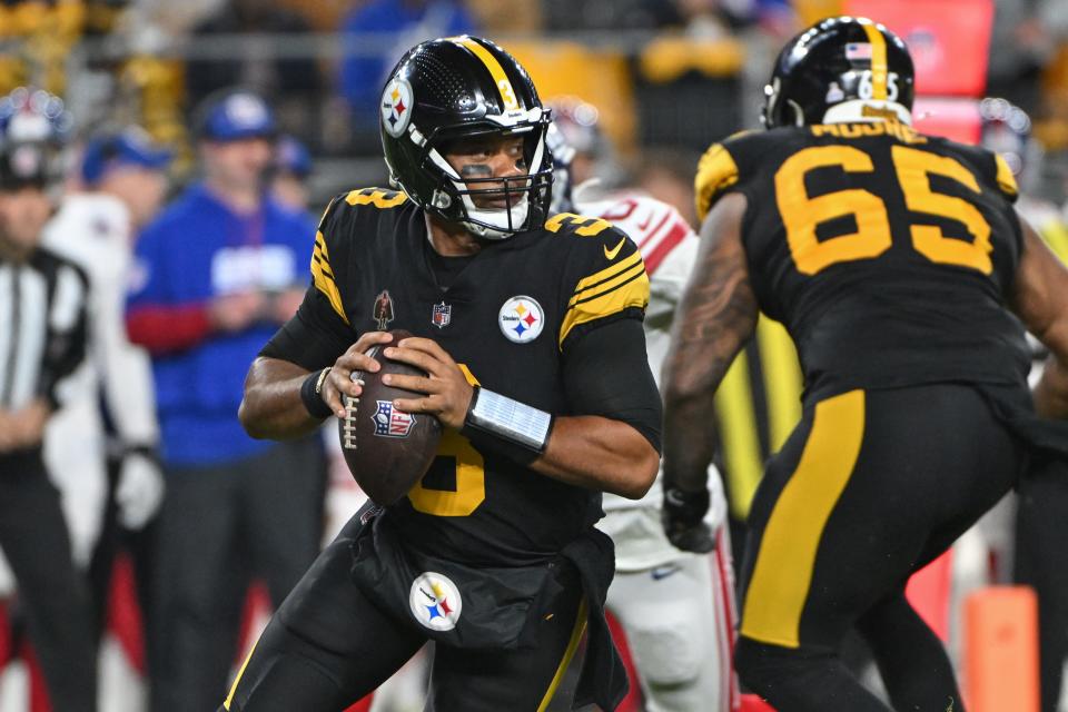 Pittsburgh Steelers quarterback Russell Wilson (3) looks to pass against the New York Giants during the first quarter at Acrisure Stadium. Mandatory Credit: Barry Reeger-Imagn Images