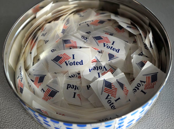 A tin of I Voted stickers catch the early morning light just as the polls open at 7 a.m. at the Chatham Community Center.
It was pretty quiet at the Chatham Community Center just after the polls opened at 7 a.m. on primary election day, Sept. 3, 2024. Town Clerk Julie Smith said that about 32 residents had cast their ballots during early voting. About 550 mail-in ballots were returned of the approximately 1,400 that were sent out, she said.