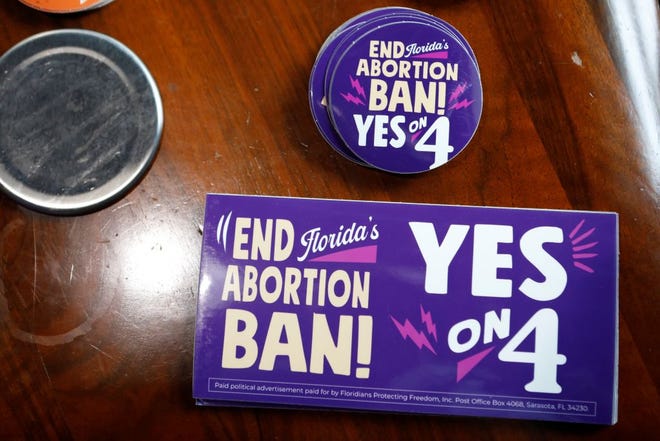 "Yes On 4!" campaign materials on ending Florida's strict abortion ban are seen as volunteers prepare to hand them out in Orlando, Florida, on October 6, 2024.