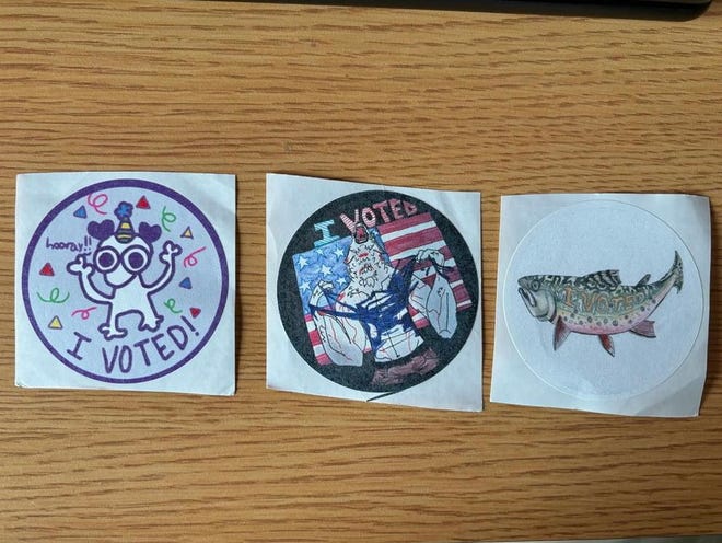"I voted" stickers given to first-time voter Mell Stoner.