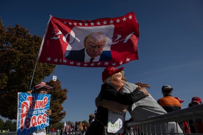 Supporters line up for a campaign rally to reelect former President Donald Trump in Greensboro, N.C., on Nov. 2, 2024.