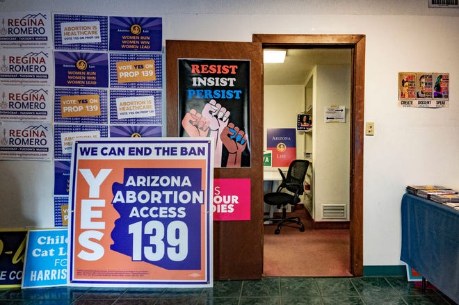 Sign in favor of Proposition 139, the right to abortion initiative, are displayed at the entrance room of the Tucson HQ of Arizona List, an association made to empower and elect progressive pro-choice Democratic women leaders, in Tucson, Arizona, October 16, 2024.
