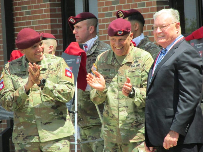 Retired Lt. Gen. Keith Kellog Jr., far right, is congratulated by Maj. Gen. Christopher LaNeve, second from right, and Command Sgt. Maj. Randolph Delapena, after being inducted into the 82nd Airborne Division Hall of Fame during a ceremony Wednesday, May 24, 2023, at Fort Bragg.