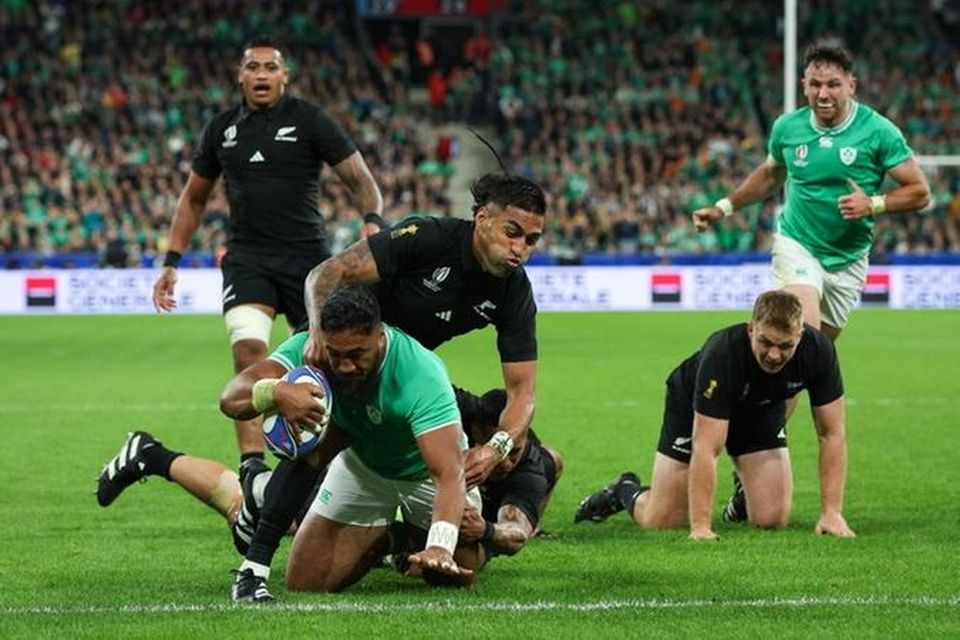 Bundee Aki of Ireland scores his sides first try  during the Rugby World Cup France 2023 Quarter Final match between Ireland and New Zealand. (Photo by Craig Mercer/MB Media/Getty Images).
