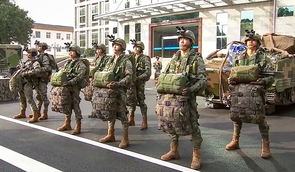 Xi Jinping acknowledged the unit’s progress and achievements during the visit. Photo: CCTV Xi Jinping acknowledged the unit’s progress and achievements during the visit. Photo: CCTV