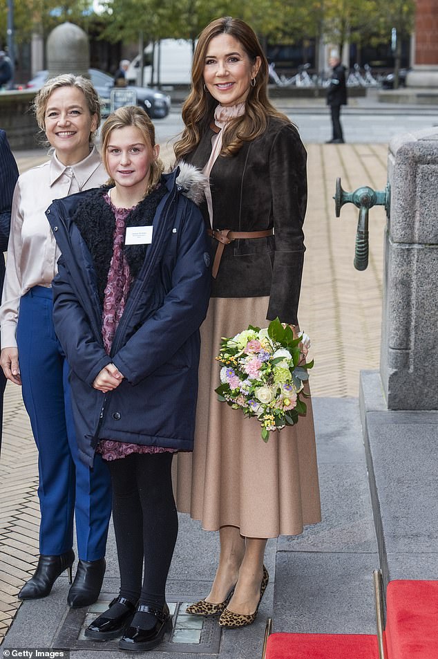 The Danish royal, 52, looked striking as she arrived at Copenhagen City Hall in Denmark to attend the Children's Aid Day award ceremony on Tuesday