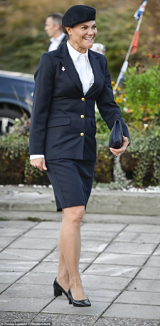 Victoria looked sophisticated es ever at the event, sporting a uniform, as she arrived at Skogshem & Wijk
