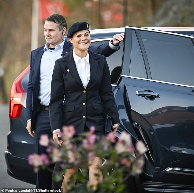 The royal appeared excited for the celebration. Local corps, known as lottakår, represent the SLK across the country, with the headquarters stationed in Stockholm