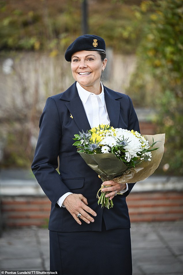 Crown Princess Victoria of Sweden wore sophisticated military attire as she celebrated the 100th anniversary of a women's voluntary organisation on Saturday