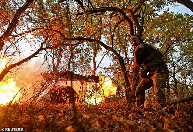 A Ukrainian service member from the special police unit Hyzhak (Predator) fires a howitzer D30 towards Russian troops. Russia reacted with fury over reports the U.S. is allowing missile attacks deep inside Russia