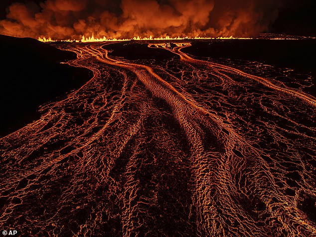 Full flow: The new volcanic eruption pictured after it started on the Reykjanes Peninsula in Iceland late on Wednesday evening