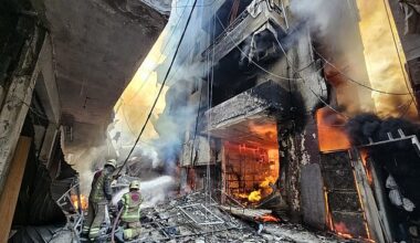 Firefighters battle the flames after a building was hit in an Israeli airstrike in the Hadath neighbourhood of Beirut's southern suburbs