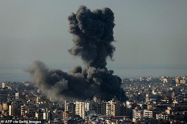 Heavy smoke rises during an Israeli airstrike that targeted Beirut's southern suburbs
