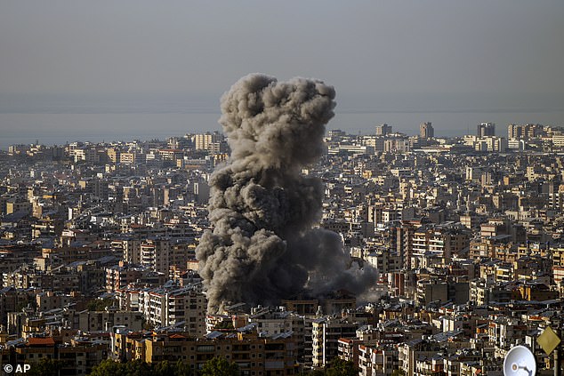 Smoke rises after an Israeli airstrike on Dahiyeh, in the southern suburb of Beirut