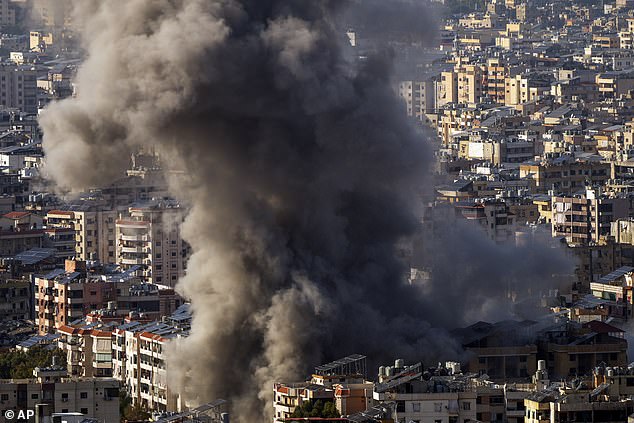 Smoke rises after an Israeli airstrike on Dahiyeh, in the southern suburb of Beirut