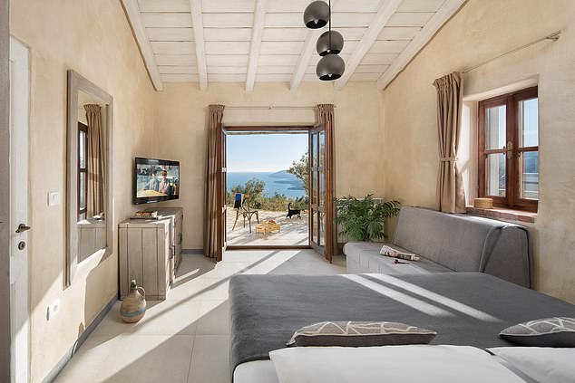 Accommodating up to 20 guests across its two properties, snaps of its eight bedrooms reveal stunning modern interiors with bare plaster walls, exposed beams, glass panels, tiled flooring and hand-crafted furniture