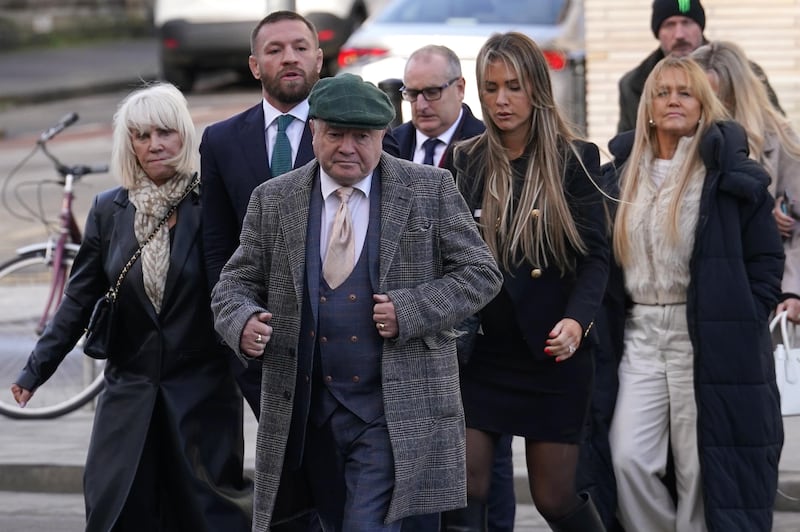 Cllr Philip Sutcliffe (front) accompanied MMA fighter Conor McGregor to the High Court in Dublin on Friday for the conclusion of the civil action against Mr McGregor taken by Nikita Hand. Photograph: Brian Lawless/PA Wire 