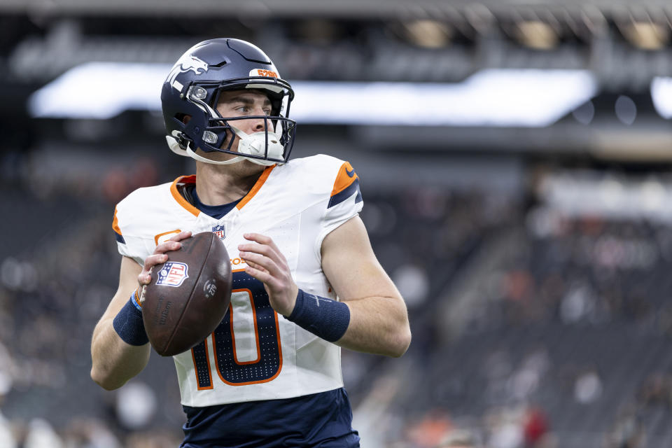 Bo Nix #10 of the Denver Broncos looks to pass prior to an NFL Football game against the Las Vegas Raiders at Allegiant Stadium on November 24, 2024 in Las Vegas, Nevada. (Photo by Michael Owens/Getty Images)