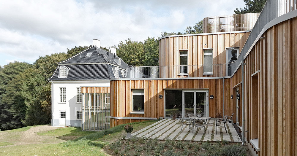 JAJA architects builds home for families in need on bagsværd lake
