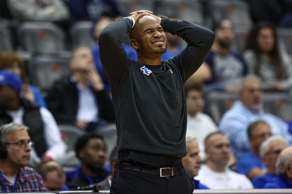 Nov 4, 2024; Newark, New Jersey, USA; Seton Hall Pirates head coach Shaheen Holloway reacts during the first half against the St. Peter's Peacocks at Prudential Center. Mandatory Credit: Vincent Carchietta-Imagn Images