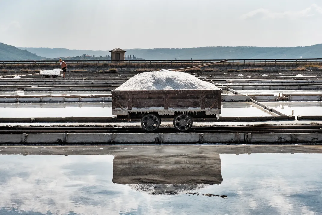 Workers harvest salt in Piran, across from Venice on the Adriatic Coast. Janez Bratovž of JB Restavracija uses this salt at his Ljubljana establishment.