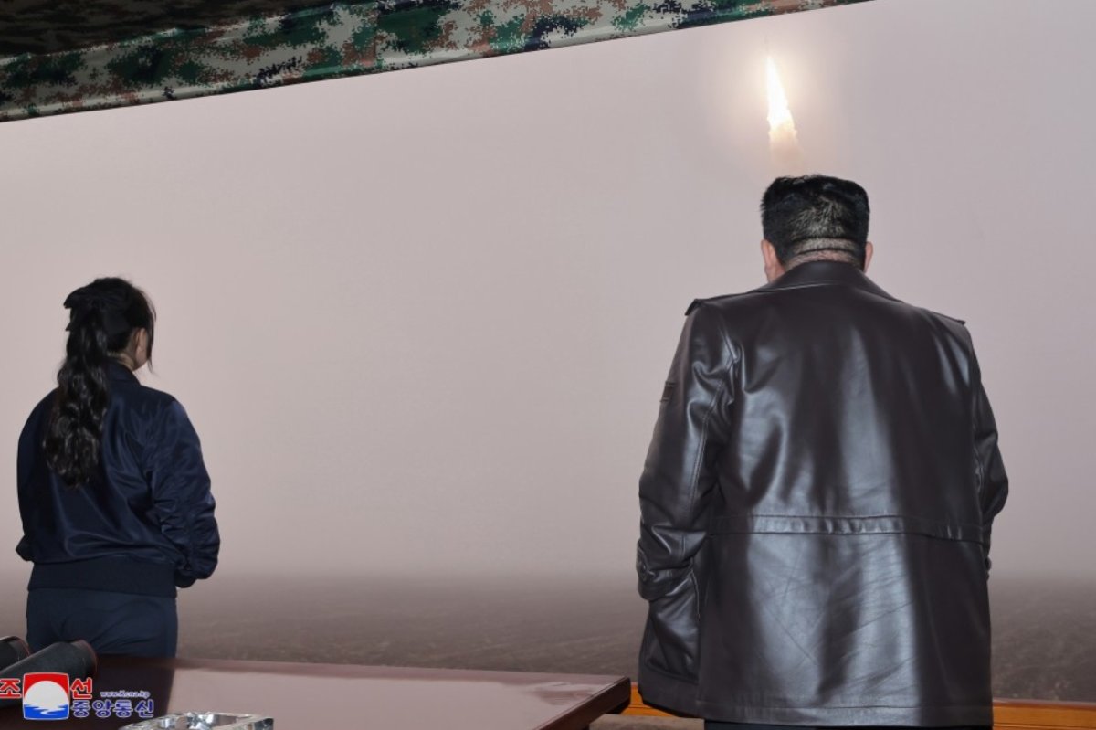 Kim and Daughter Observe Missile Test