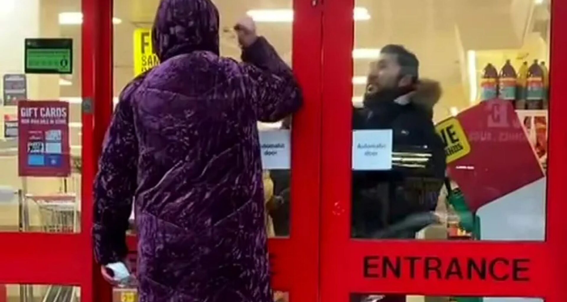 Bizarre moment Iceland security guard snares shoplifter by locking her in as pyjama-clad pal bangs on glass outside
