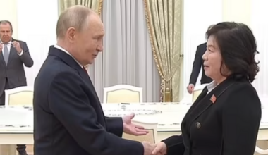 Vladimir Putin awkwardly shakes North Korean minister's hand for an entire minute
