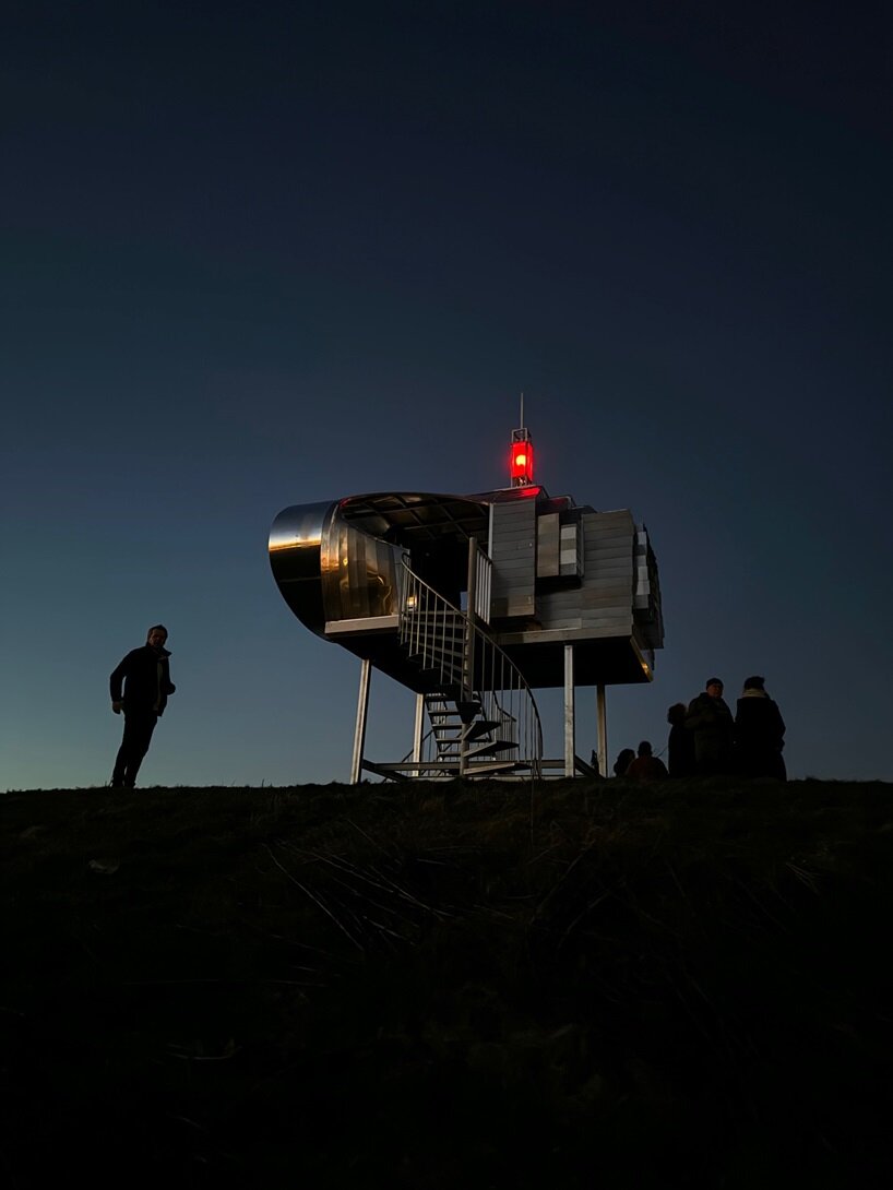 solar-powered viewing platform by rob voerman takes on spaceship form in the netherlands