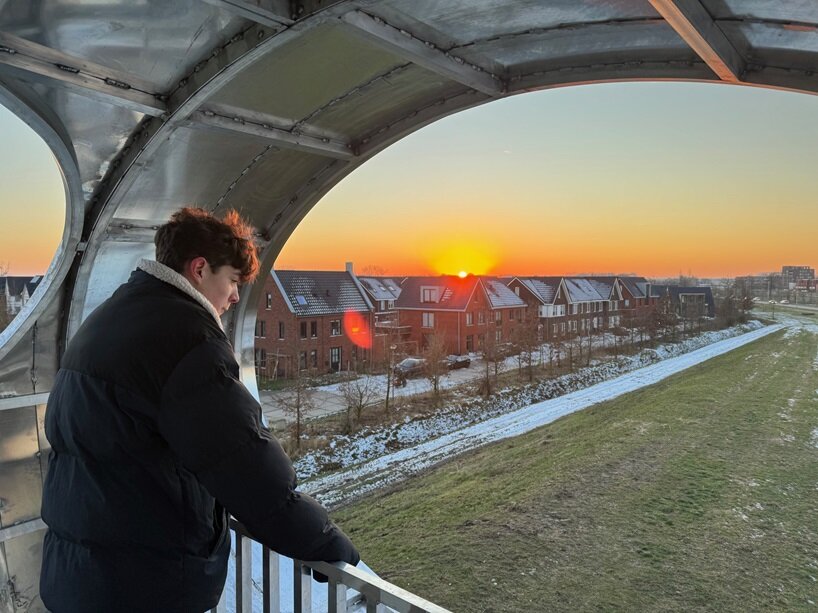 solar-powered viewing platform by rob voerman takes on spaceship form in the netherlands