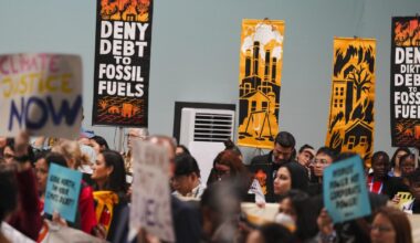 Protesters gather at U.N. climate talks as progress on deal slows