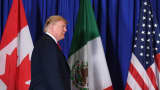 US President Donald Trump arrives to deliver a statement along with Mexican President Enrique Pena Nieto and Canadian Prime Minister Justin Trudeau, on the signing of a new free trade agreement in Buenos Aires, on November 30, 2018, on the sidelines of the G20 Leaders' Summit.