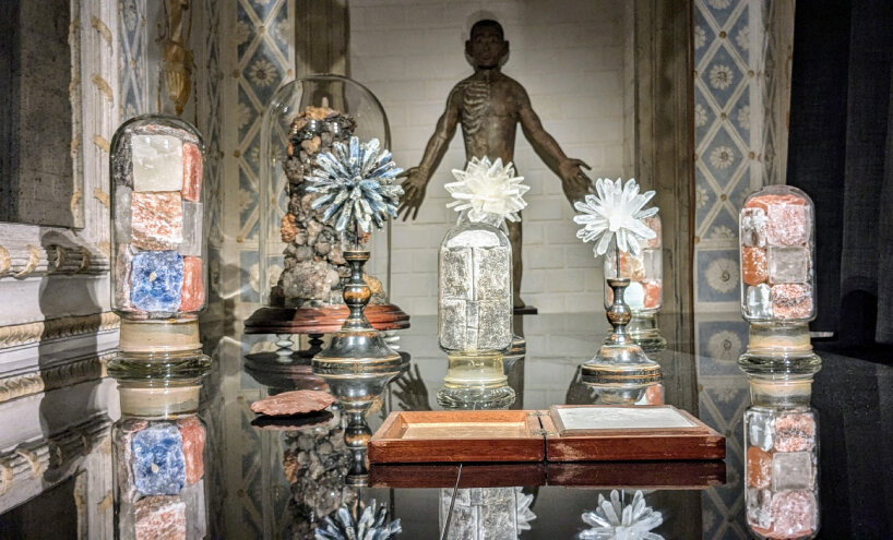 natural crystals covered in transparent glasses | image © designboom