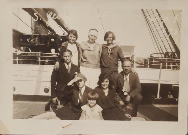 Josef  Kováč  (left center) en route to the United States from Czechoslovakia, 1920s.