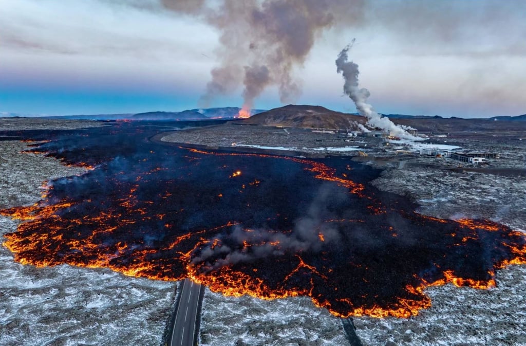 A panoramic view of the eruption site, with the Blue Lagoon area to the right and the active fissure in the distance in the background. Photo: AP A panoramic view of the eruption site, with the Blue Lagoon area to the right and the active fissure in the distance in the background. Photo: AP