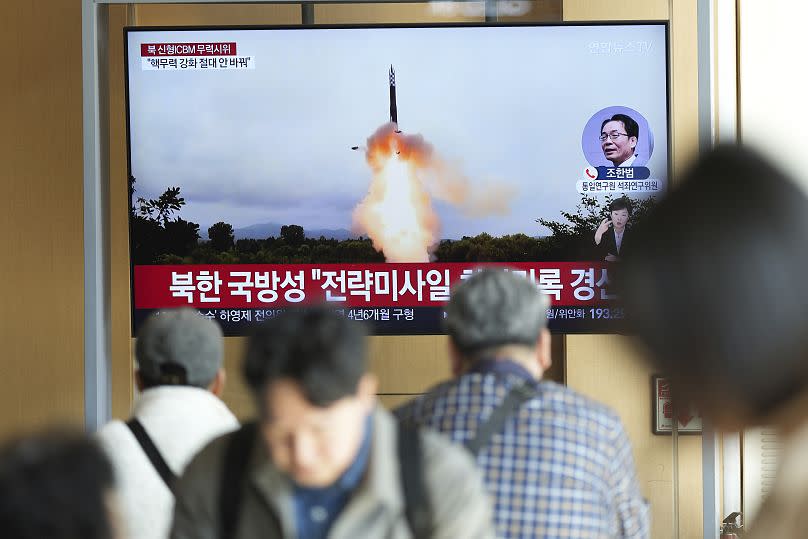 A TV screen shows an image of North Korea's intercontinental ballistic missile launch during a news program at Seoul Railway Station, 31 October, 2024
