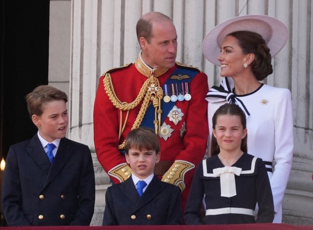 The Prince and Princess of Wales with their children, Prince George, Prince Louis and Princess Charlotte, on the balcony of Buckingham Palace in June