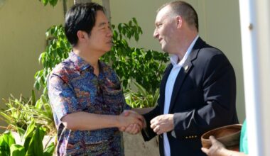 Taiwanese President Lai Ching-te (L) shakes hands with Hawaii Governor Josh Green during his stopover visit to the US island state (Ronen ZILBERMAN)